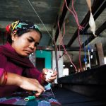 Dhaka fabric being woven on a loom