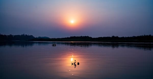 Chitwan travel Guide to see the Sunset over the Rapti River