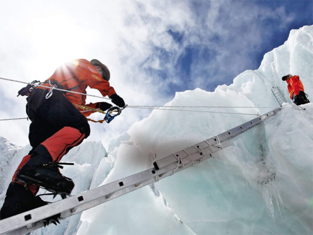 Climber walking through the crevasse in Everest, mount everest facts, interesting mount everest facts