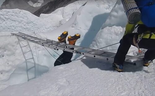 Climber fall of the ladder in Khumbu Icefall