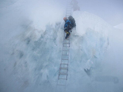 Descending the Khumbu Icefall in the fog.