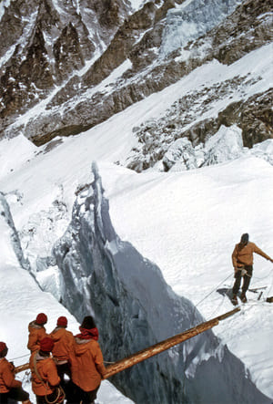 Passing through a crevasse in 1963 Everest Expedition